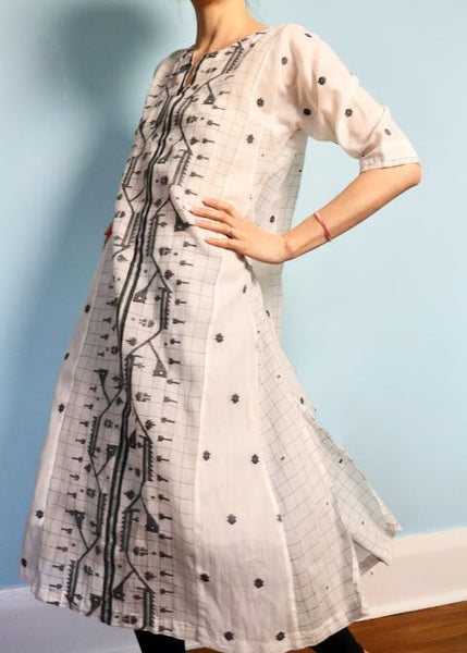 Twirling in handloom cotton dress