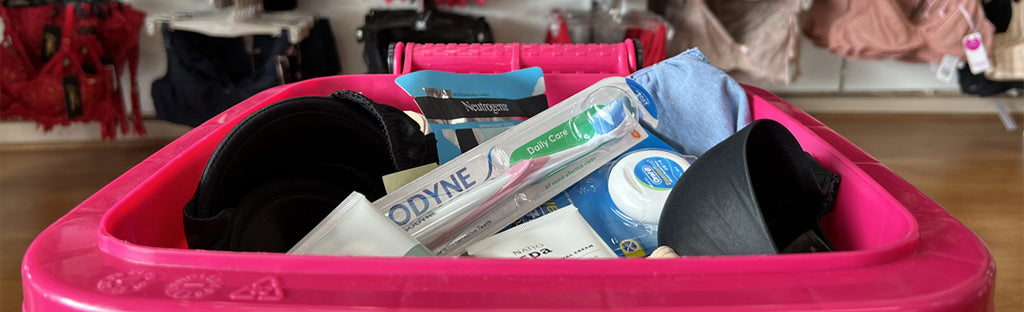 Donation bin with bras and hygiene products