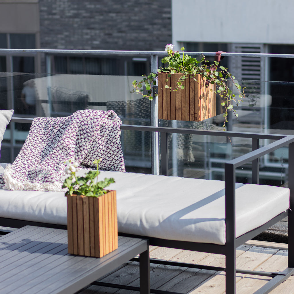 Wooden planters create atmosphere on balcony