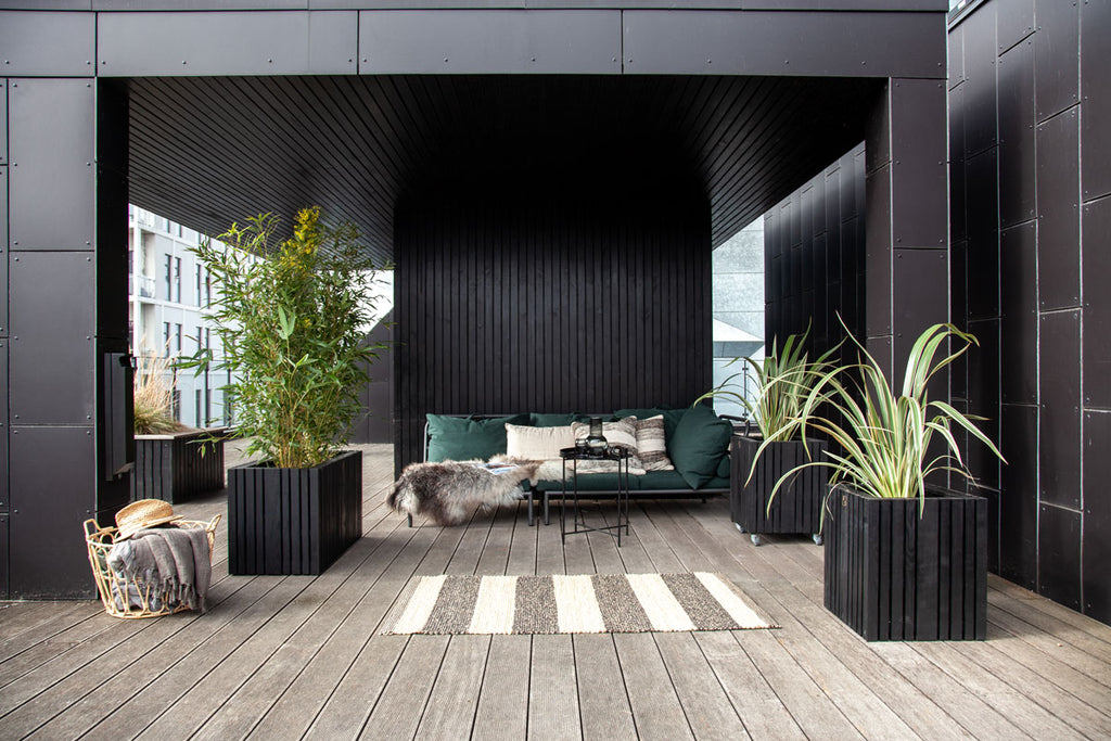 Urban terrace environment with wooden planters