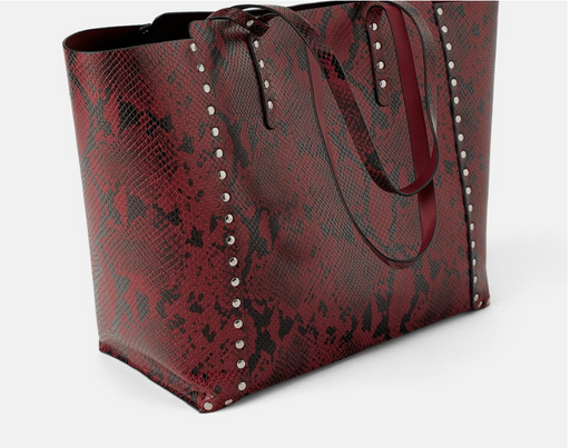 reversible studded tote bag