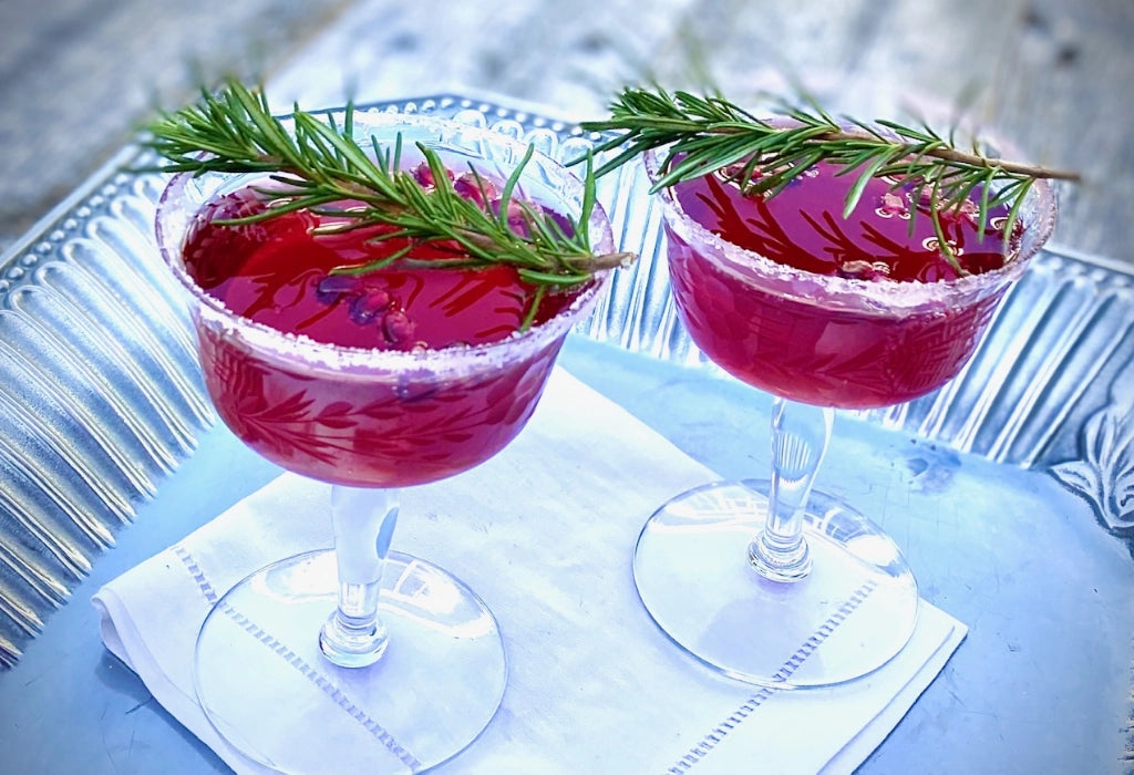 Zwei Granatapfel Prosecco Cocktails