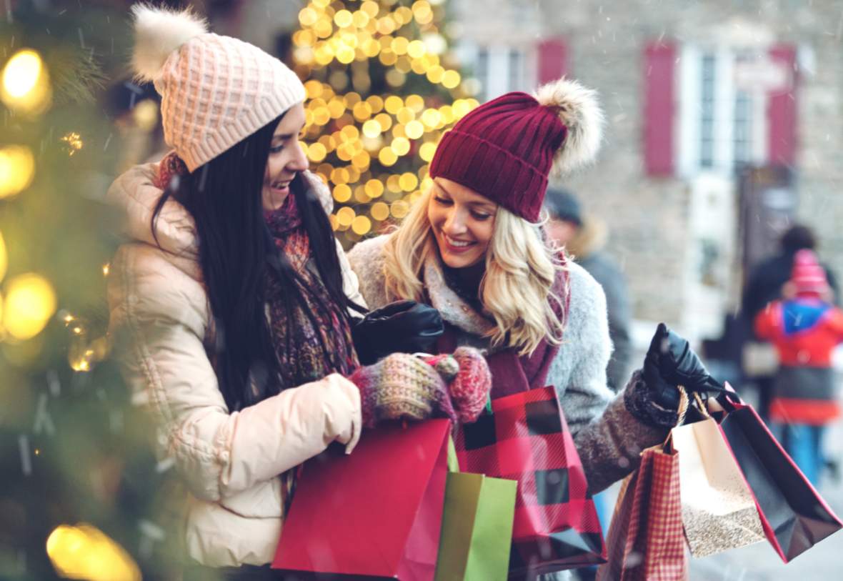 two girls shopping in christmas