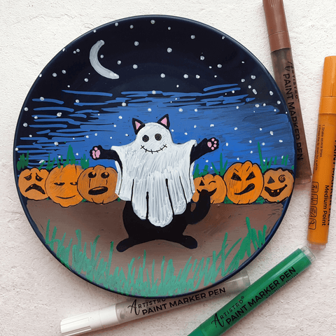 ceramic plate with ghost cat Halloween art project