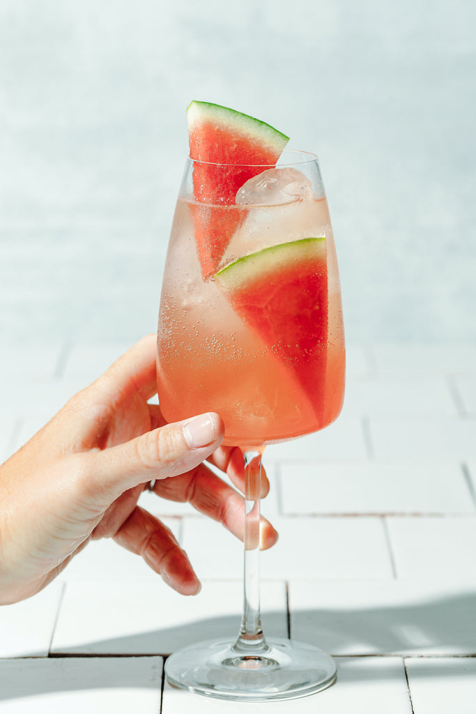 A summer spritz to send away summer made with Ana Maria Tequila and Iconic Watermelon Rose Tonic
