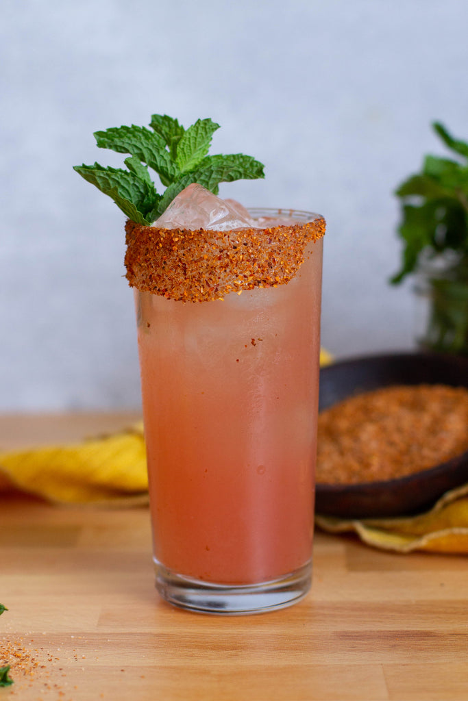 We don’t think there is anything better than a slice of watermelon with a little sprinkle of Tajin. That was until we added some gin to the situation to create this Watermelon Gin Collins. Made with seasonal, Watermelon Rose Tonic, be sure to try this mix before summer is over! 