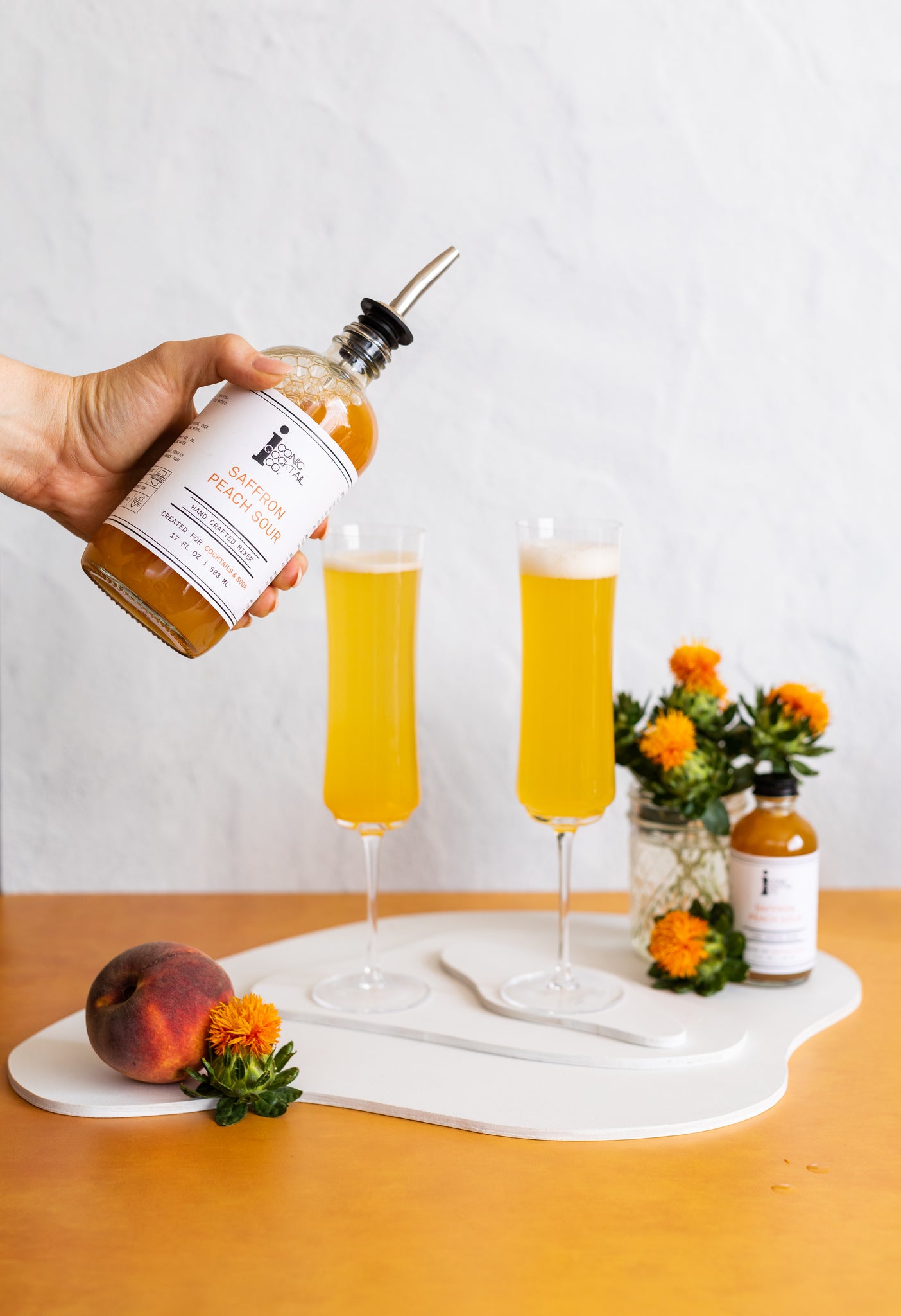 Enjoy this year’s signature drink for Saffron Peach Sour: A Perfect Bellini 