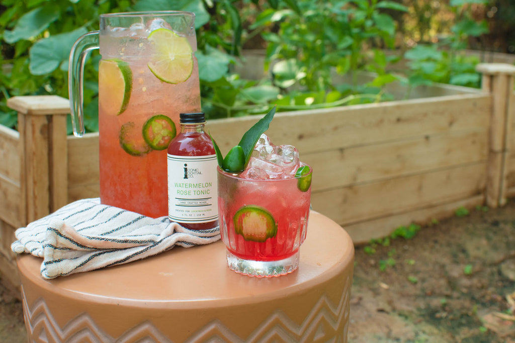 A pitcher of spicy margaritas made with Iconic Watermelon Rose Tonic. Perfect for summer or celebrating National Watermelon Month!