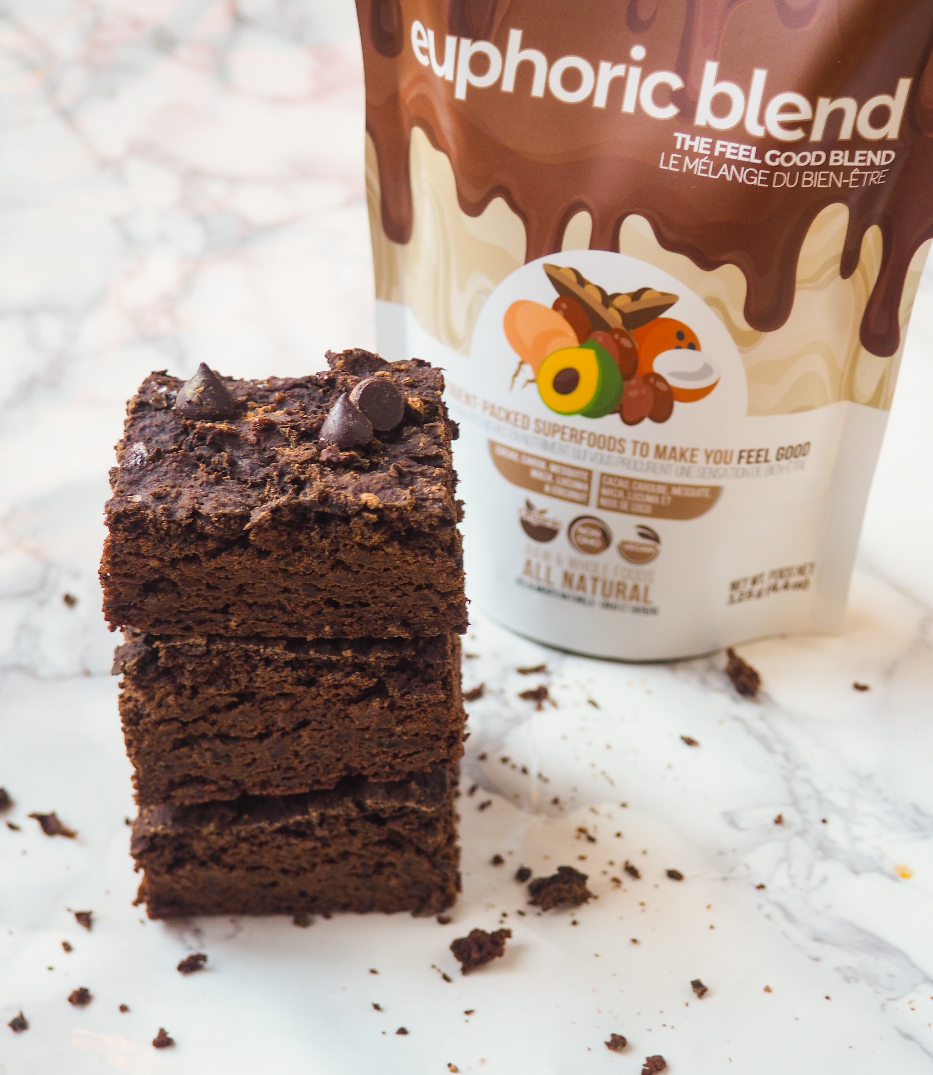 Chocolate banana brownies made using our superfood euphoric blend. Our euphoric blend has 6 powerful and delicious foods packed with antioxidants, healthy fats and adaptogens- Raw cacao, Carob, Mesquite, Maca, Lucuma and shredded Coconut. A healthy way to satisfy cravings and boost mood instantly!  Sustainably sourced, 'Better-than-fair-Trade', our blends are certified organic and plant-based making it vegan friendly with no added sugar!