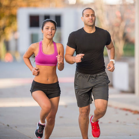 https://cdn.shopify.com/s/files/1/0047/4657/5970/files/2_people_getting_fit_running_down_the_street_480x480.jpg?v=1669119621