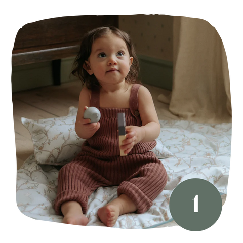 Toddler playing on the floor