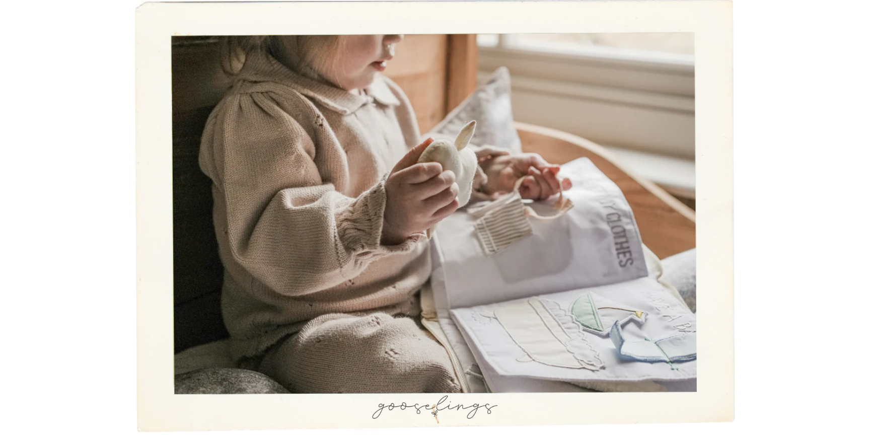 Toddler with Goodnight Gooseling Activity Book