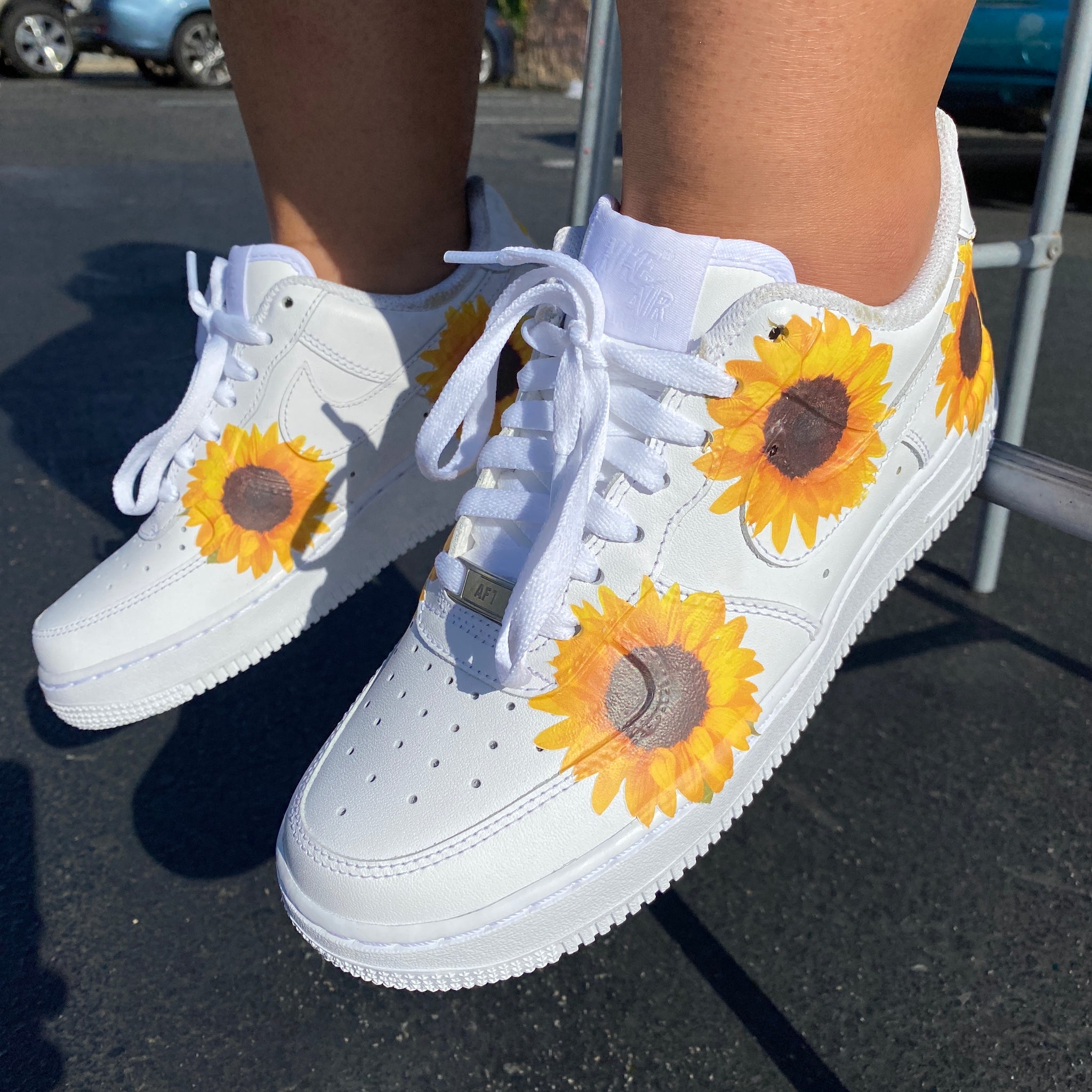 black nikes with sunflower design
