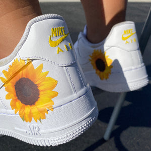 black nikes with sunflower design