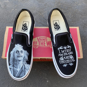 white slip on vans art