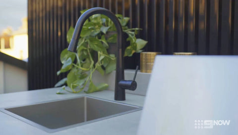 kitchen mixer in matte black and brushed nickel top-mount sink