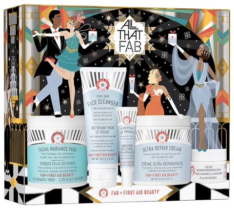 Lithe Lashes Blog Holiday Gift Ideas showcasing First Aid Beauty Skincare bundle from Sephora website. Includes facial pads, face cleanser, lip therapy, dry skin cream. 1920's style dancers on the gift box holding christmas presents and dancing