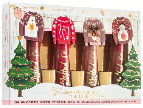 Lithe Lashes Blogs Holiday Gift Ideas Too Faced Christmas Snuggles and Melted Kisses Liquid Lipstick Set-Sephora, showcasing 4 lipsticks in a christmas box set with chrsitmas trees and ornaments, and holiday sweaters with golden casing 