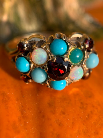 Vintage Magnality's Gumball Vintage Ring featuring Opals, Garnet, and Turquoise gemstones. 
