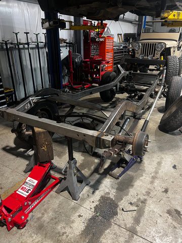 Custom brackets shown on new Jeep YJ frame