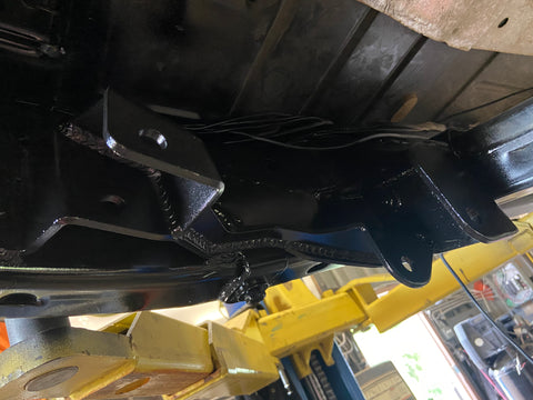Newly welded on brackets are shown for the long arm lift kit on the Jeep Wrangler JK