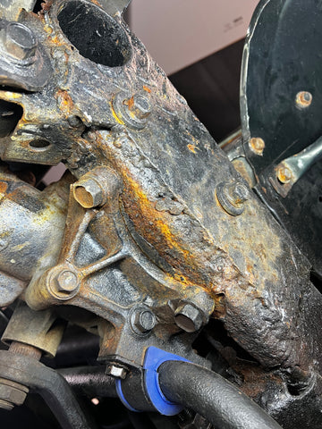 A picture of a rusted Jeep YJ Frame