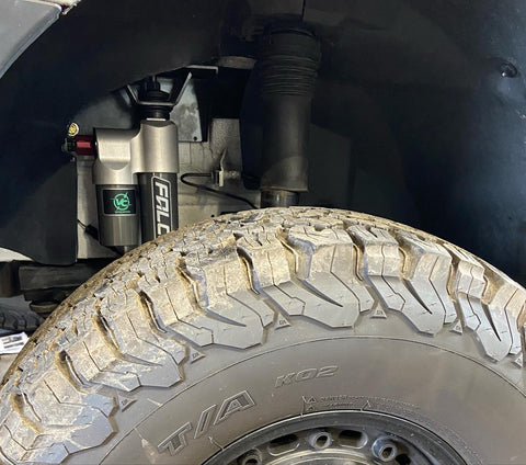 Vancompass Stage 2.3 kit with Falcon 3.3 adjustable shocks on the Lifted Sprinter Van