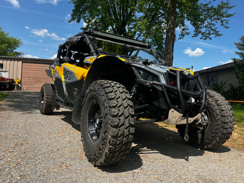 Can Am Maverick X3 with custom wrap and lift kit
