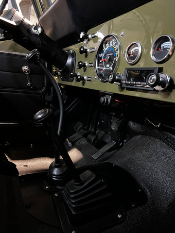 Up close view of the new dash controls and shift knobs on the Jeep Scrambler