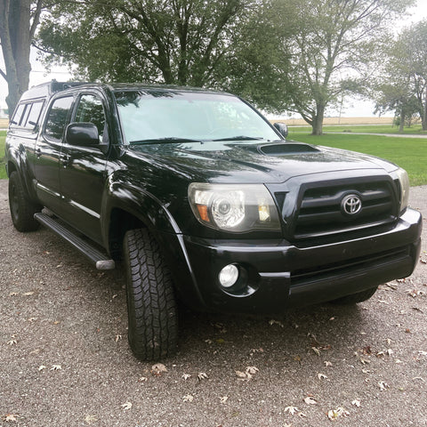 Toyota Tacoma sits outside of the old shop