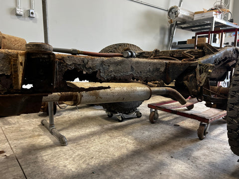 A rusty Jeep frame