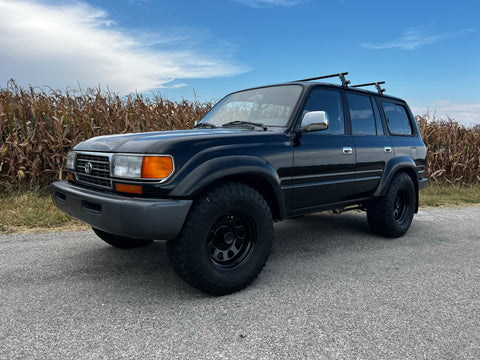An 80 series land cruiser with 35s