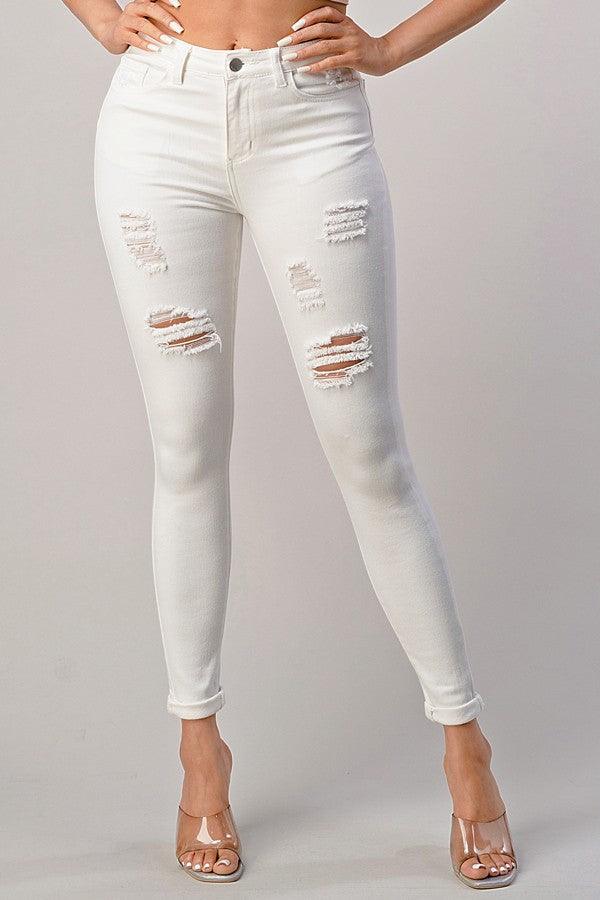 white skinny jeans with rips