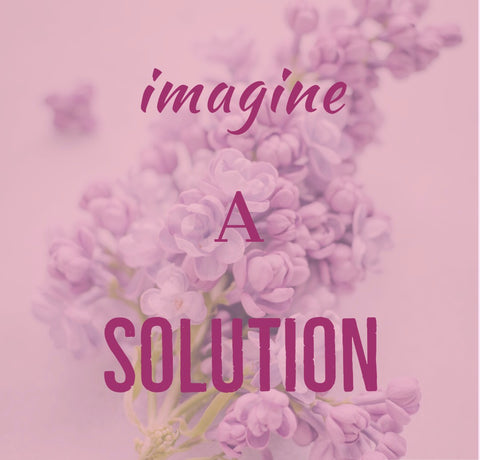 Slogan Imagine a Solution on a faded floral background