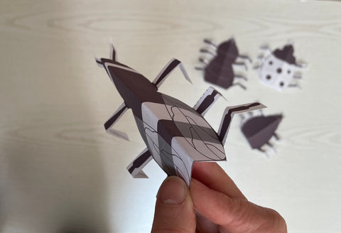 close up of folded paper bumblebee