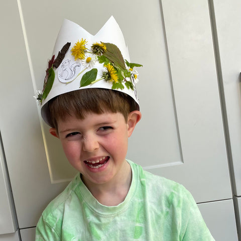 boy in paper crown