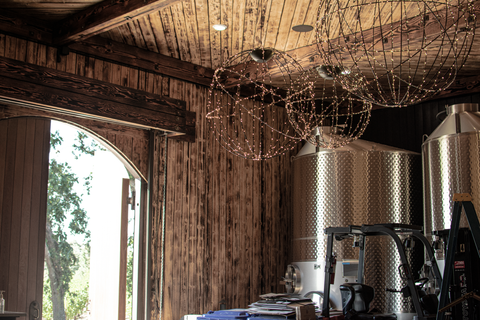 Installation of Lee Display's Hanging Spheres for the Hill Family Winery's newest tasting experience