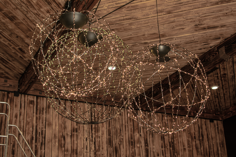 Installation of Lee Display's Hanging Spheres for the Hill Family Winery's newest tasting experience