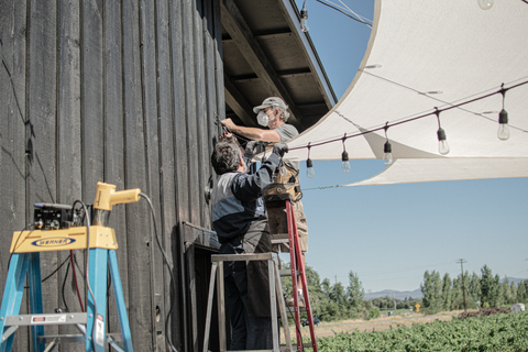 Installation of Lee Display's Vintage Patio Lights for the Hill Family Winery's newest tasting experience