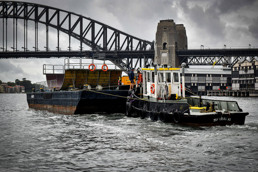 volcom beer'a'dise boat under harbour bridge