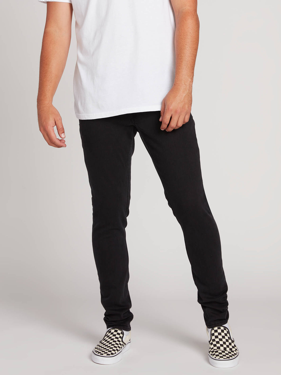 black tapered skinny jeans