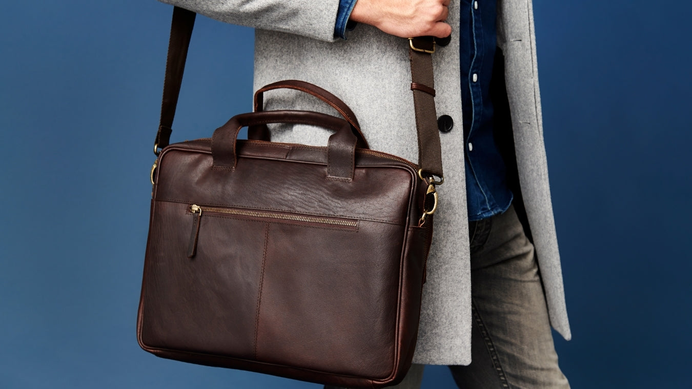 formal wear with leather messenger bag