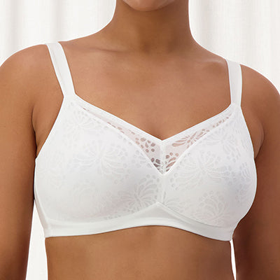 Model wears Lacy Wirefree Minimiser Bra in White