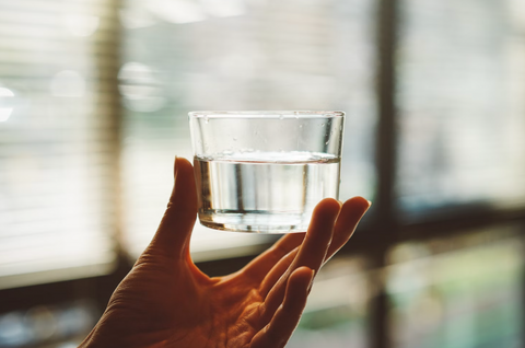 holding-glass-of-water