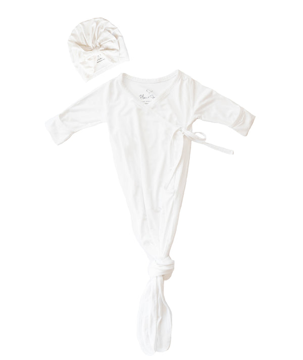 white knotted baby gown