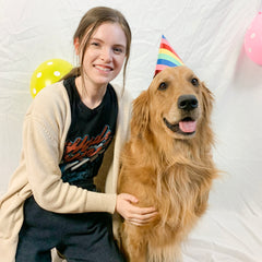 Our office dog posing with a coworker