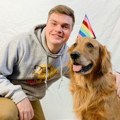 Our office dog posing with a coworker