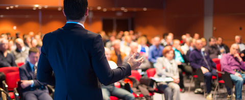Business speaker presenting in a conference