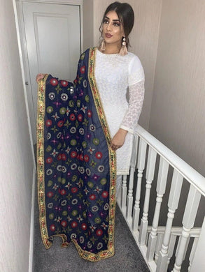 white dress with red chunri dupatta