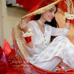 white salwar kameez with red dupatta